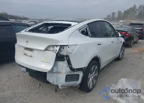 2023 Tesla Model Y Awd/Long Range Dual Motor All-Wheel Drive z USA, uszkodzony, nr VIN 7SAYGDEE1PA117401